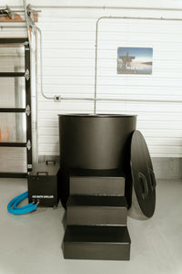 Ice bath tub with the lid removed and leaning against the tub